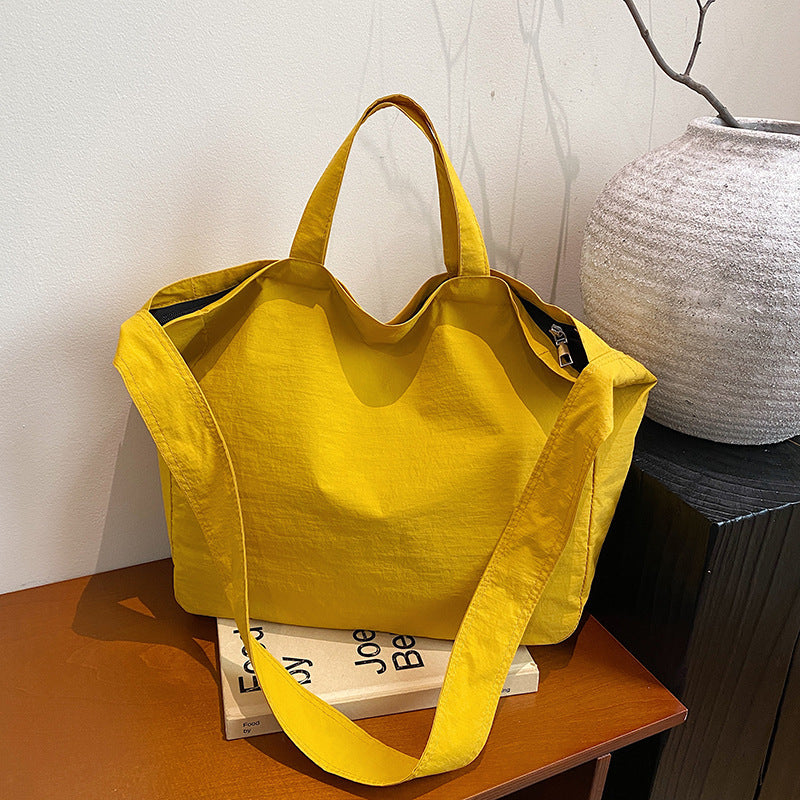 L Women's New Portable Canvas Hand-held Pocket Large-capacity Leisure Joker Shoulder Slung Tote Bag